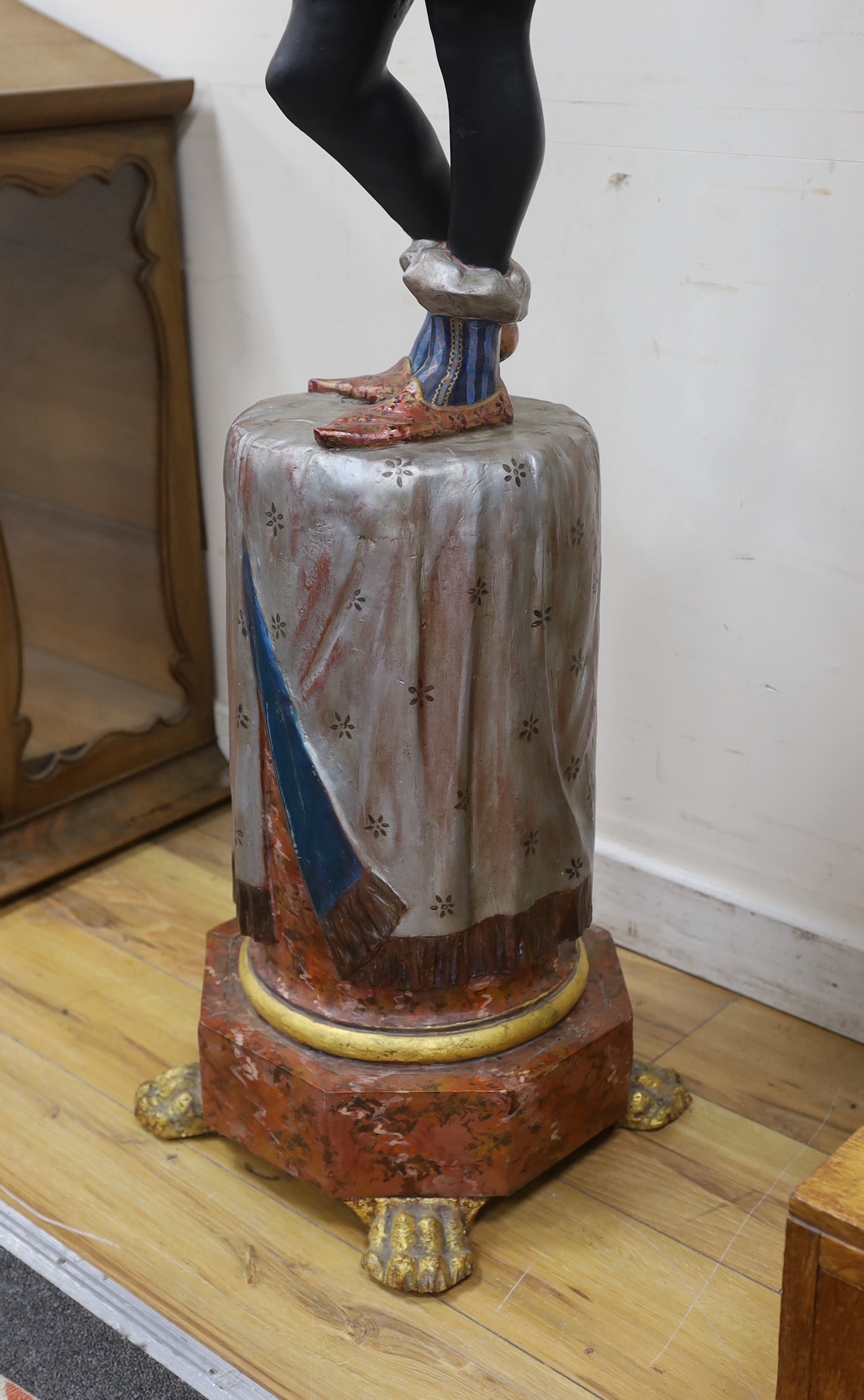A painted composition Blackamoor waiter, lacking tray, height 142cm